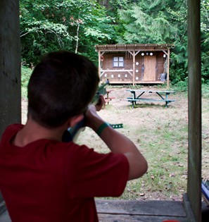 Camper at riflery range